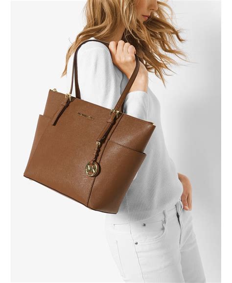 michael kors jet set east west top zip tote